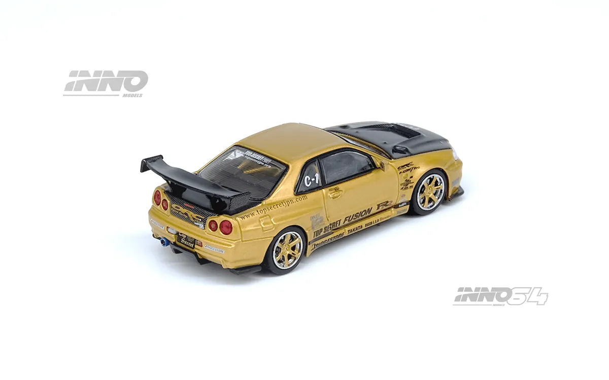 Nissan Skyline GT-R R34 Top Secret Gold 1:64