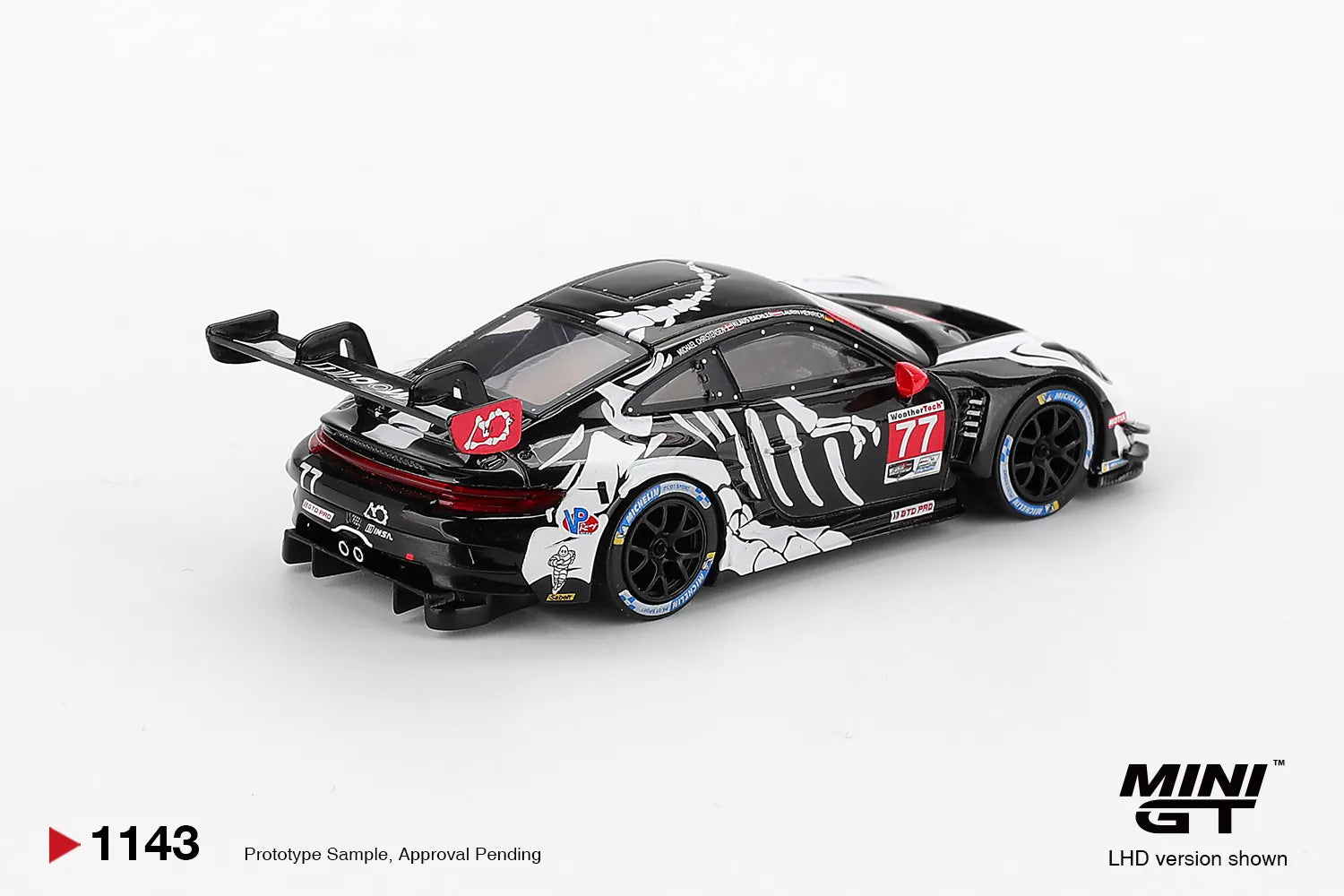 Mini GT Porsche 911 GT3 R #77 AO Racing Skeleton Rexy 2025 IMSA #1143 1:64